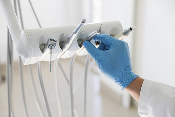Professional Root Canal Treatment technician working in Manchester, NH